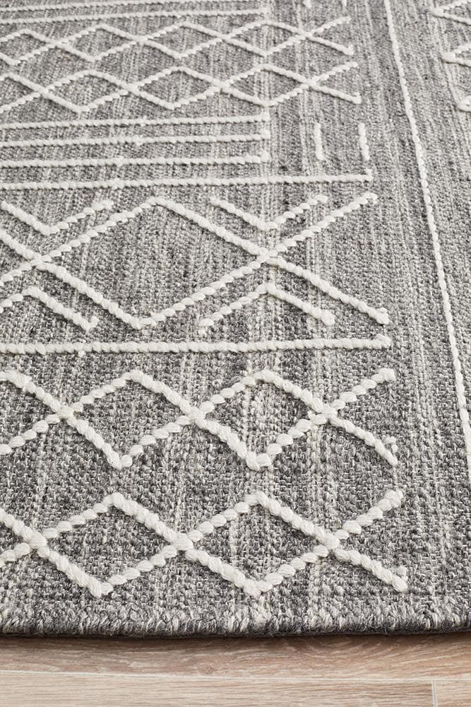 arya stitch woven silver grey rug edge