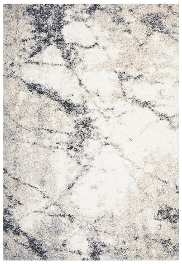 The Moonlight Marble Rug is a luxurious and modern addition to any home. Its shaggy texture and plush