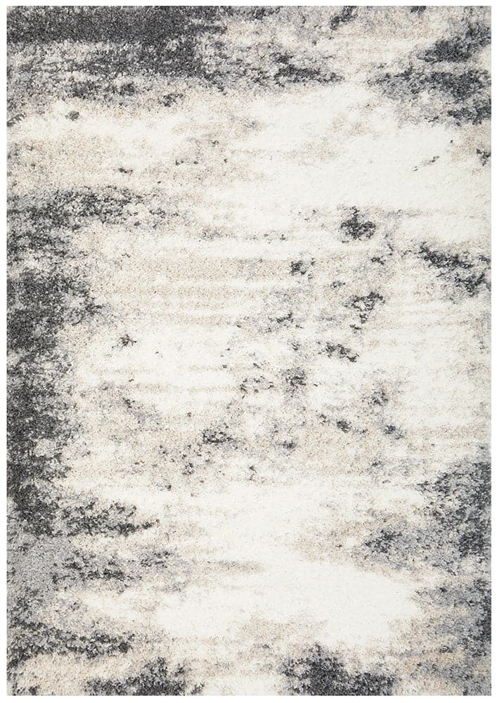 The Moonlight Opal Rug is a luxurious and modern addition to any home. With its shaggy texture